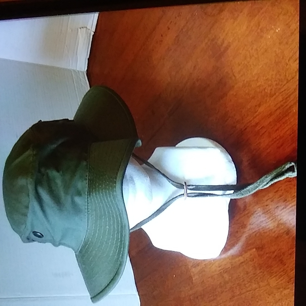 NWOT. Army green Bucket hat. Size 7